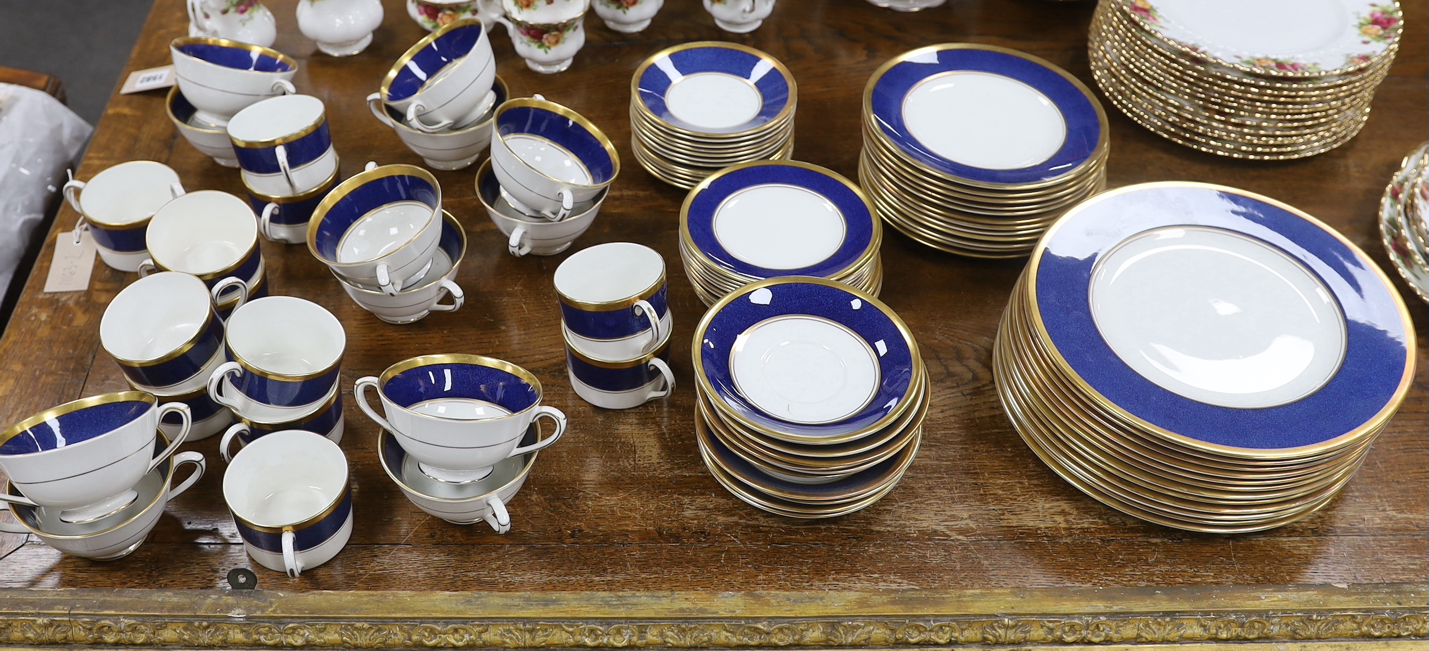 Coalport Athlone Blue dinnerware including cups and saucers, twin handled bowls and plates, largest 27cm in diameter